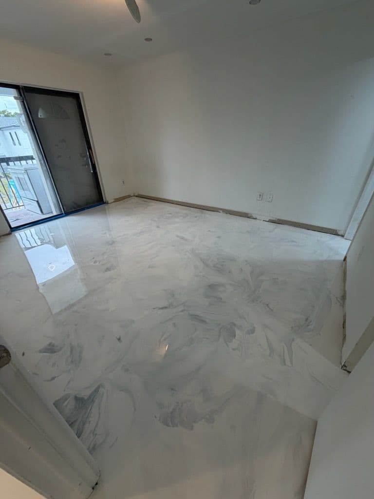 Gallery photos for Chic Metallic Epoxy Flooring Transformation in South Florida Apartment: Image #1