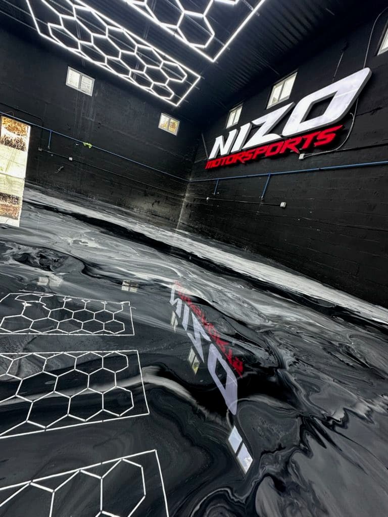 Gallery photos for Sleek Metallic Epoxy Floor for Nizo Motorsports: Image #1